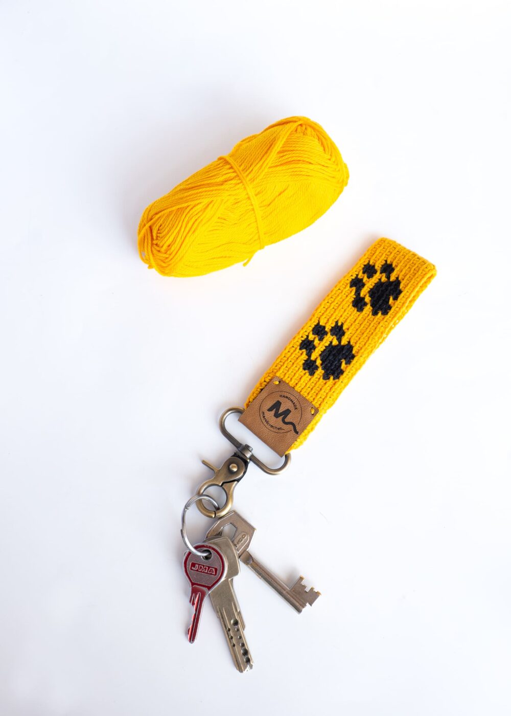 llavero con patitas de perro o gato